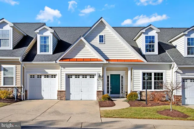 a living room with furniture dining area and a table