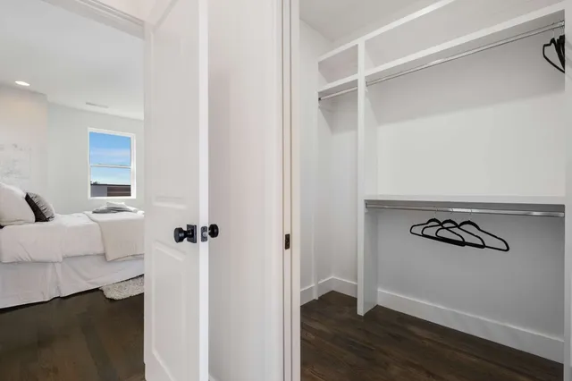a bathroom with a glass shower door and a bathtub