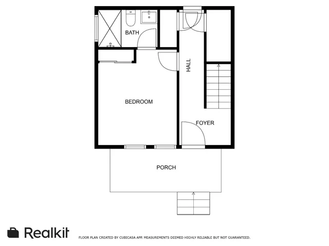 a picture of a bench in front of a door