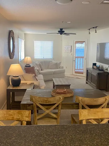 a bedroom with bed and window