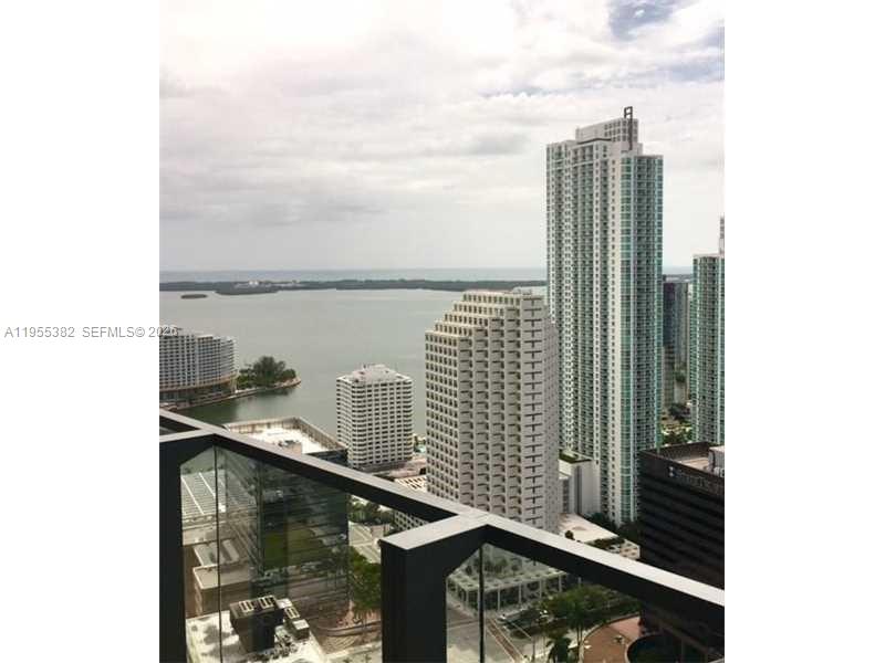 68 Southeast 6th Street, Unit 3502 Miami, FL 33131 - Photo 14 of 16 a city view from a balcony