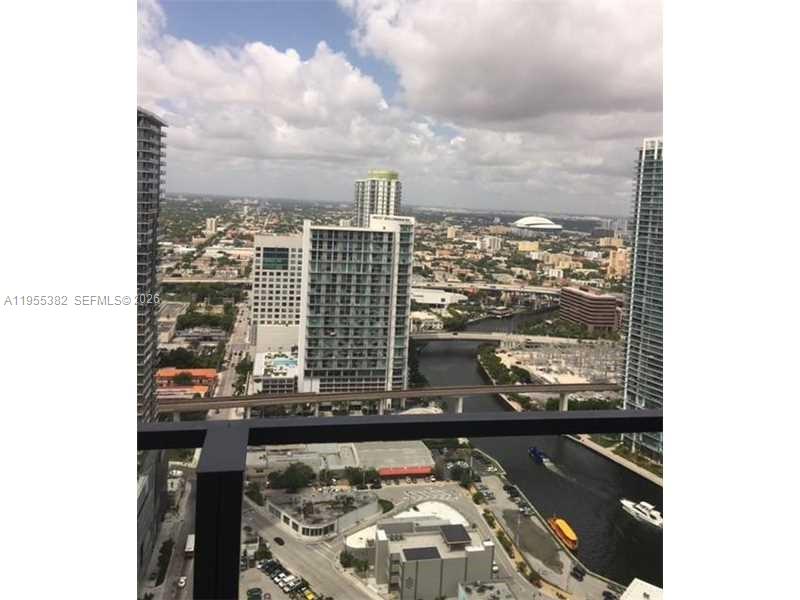 68 Southeast 6th Street, Unit 3502 Miami, FL 33131 - Photo 15 of 16 a view of a lake