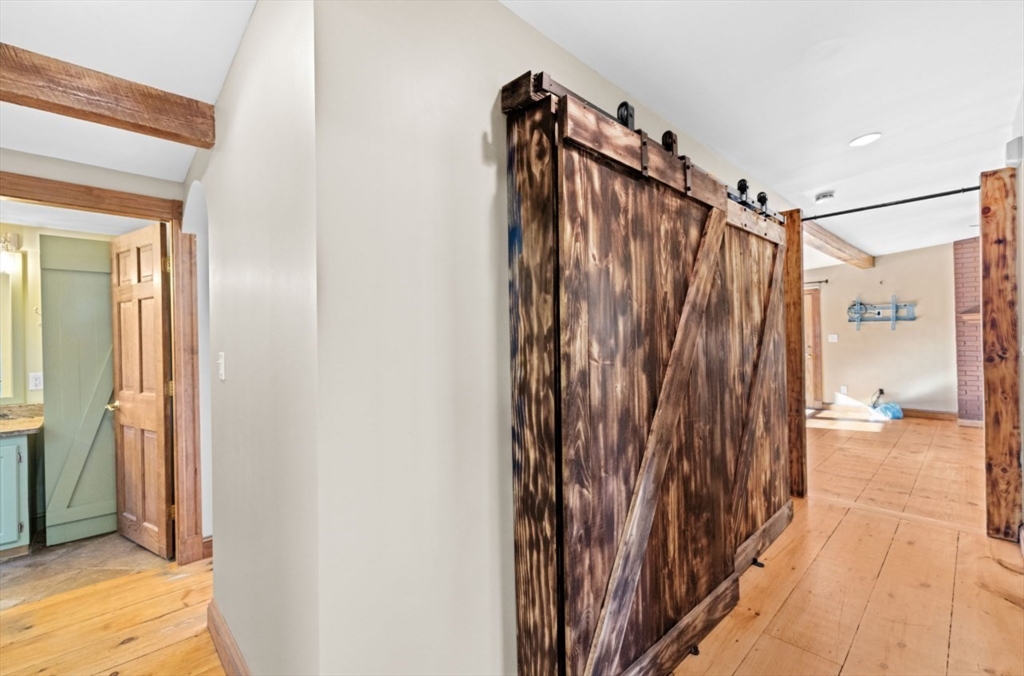 12 Richfield Road Scituate, MA 02066 - Photo 13 of 28 a view of a bathroom from the hallway