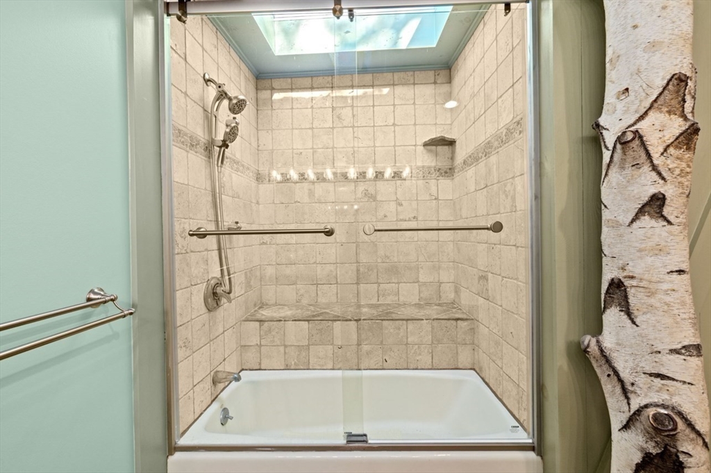 12 Richfield Road Scituate, MA 02066 - Photo 18 of 28 a bathroom with a bath tub