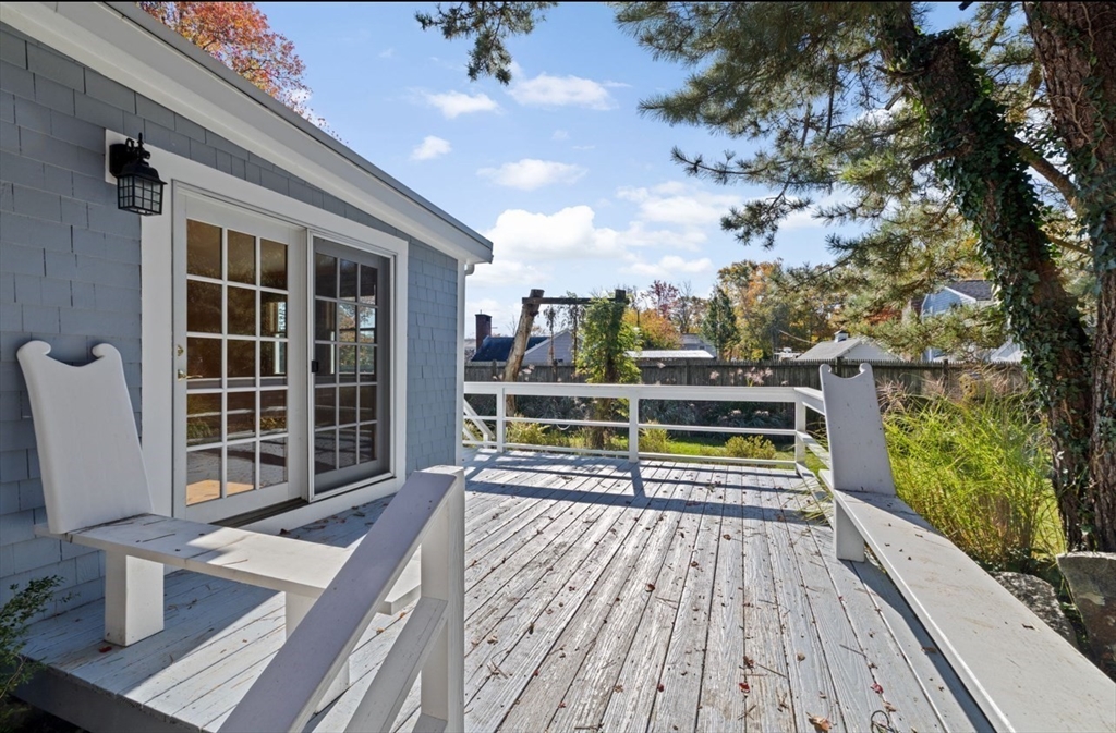 12 Richfield Road Scituate, MA 02066 - Photo 20 of 28 a view of a balcony with wooden floor and iron fence