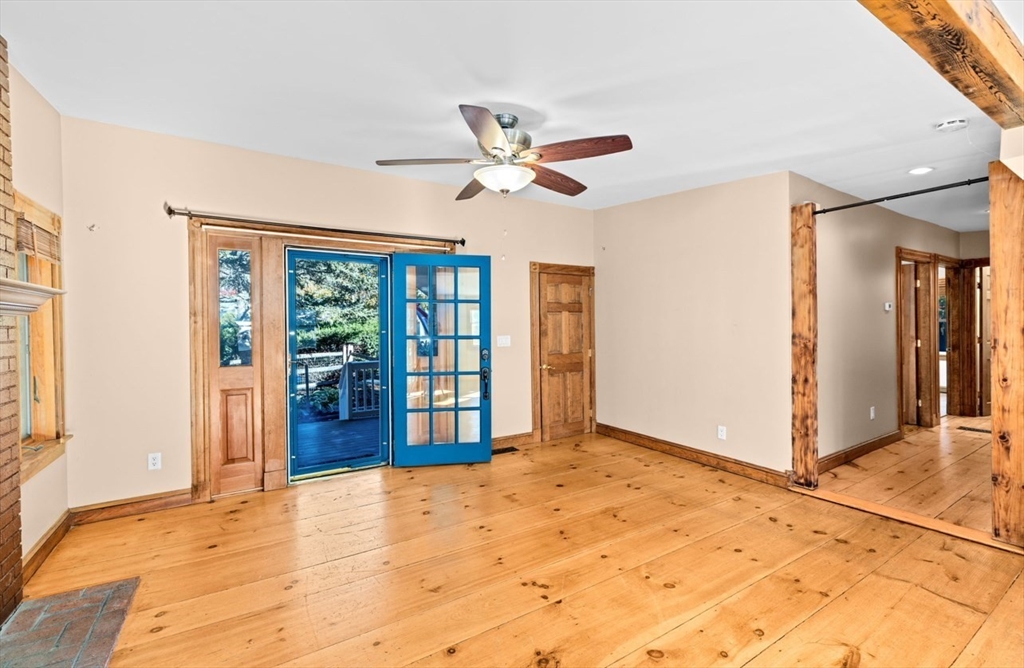 12 Richfield Road Scituate, MA 02066 - Photo 5 of 28 a view of an empty room with window and a kitchen