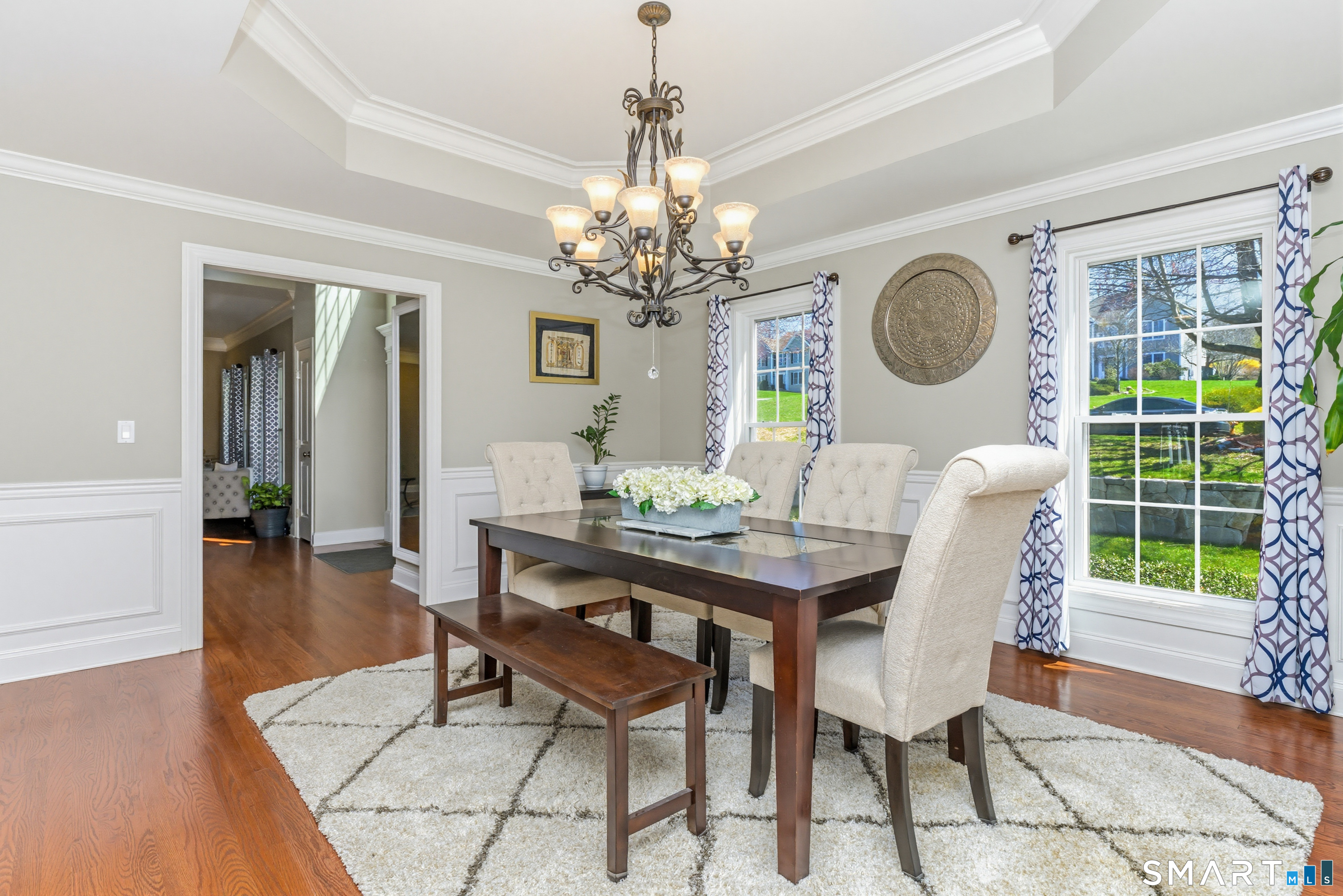 30 Block Farm Road Monroe, CT 06468 - Photo 17 of 40 a view of a dining room with furniture a chandelier and wooden floor