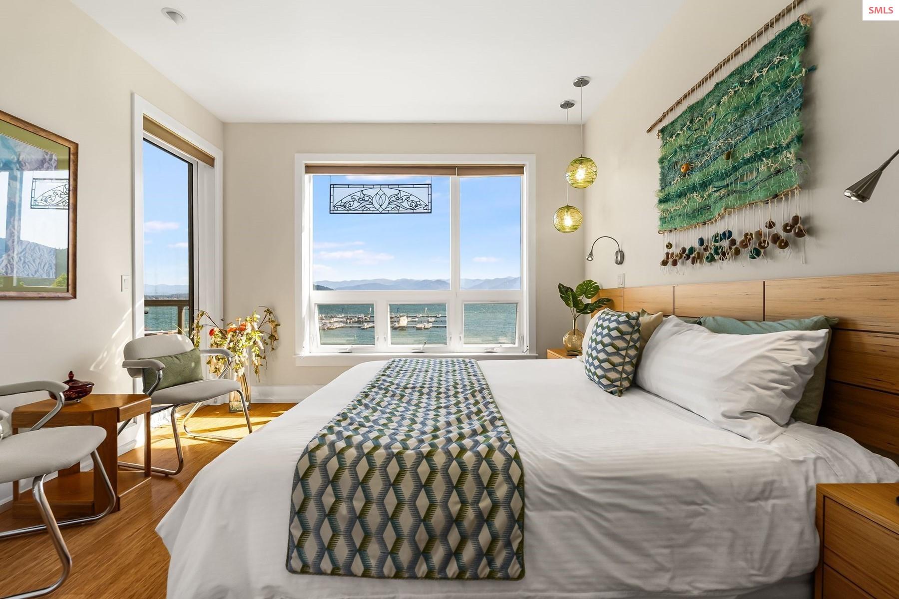 402 Sandpoint Avenue, Unit 225 Sandpoint, ID 83864 - Photo 6 of 57 This waterfront bedroom features an En Suite Bathroom with many bespoke features