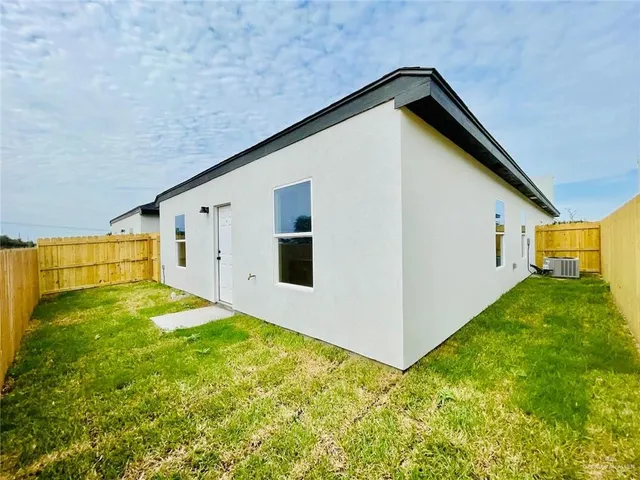 a view of backyard of house
