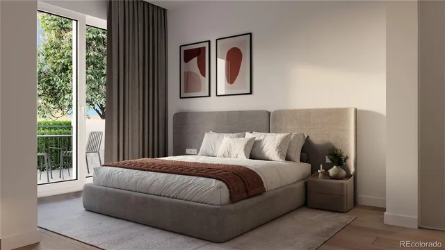 a bedroom with a bed and furniture