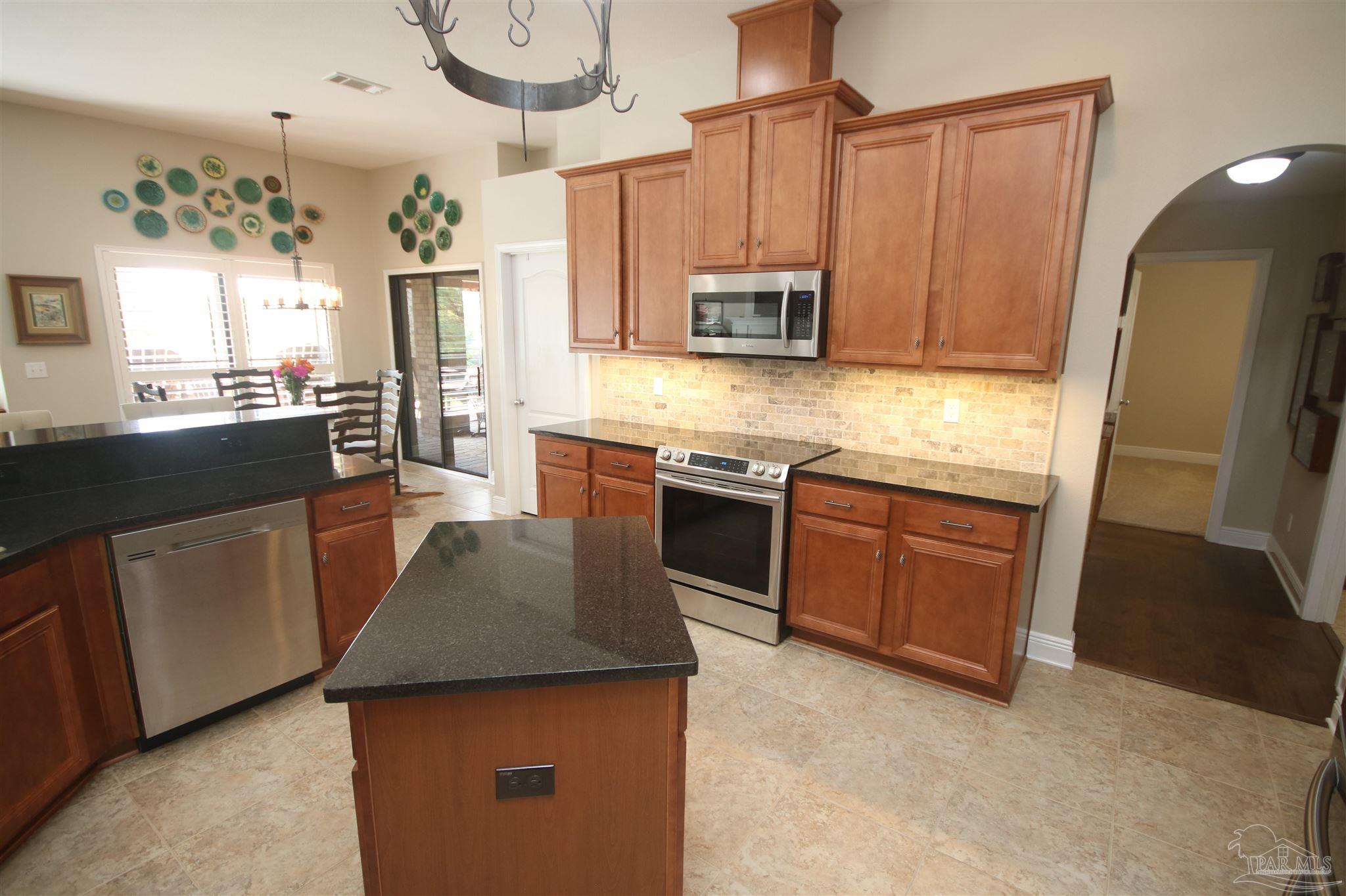 5790 Dunridge Drive Pace, FL 32571 - Photo 22 of 50 microwave & glass top range.