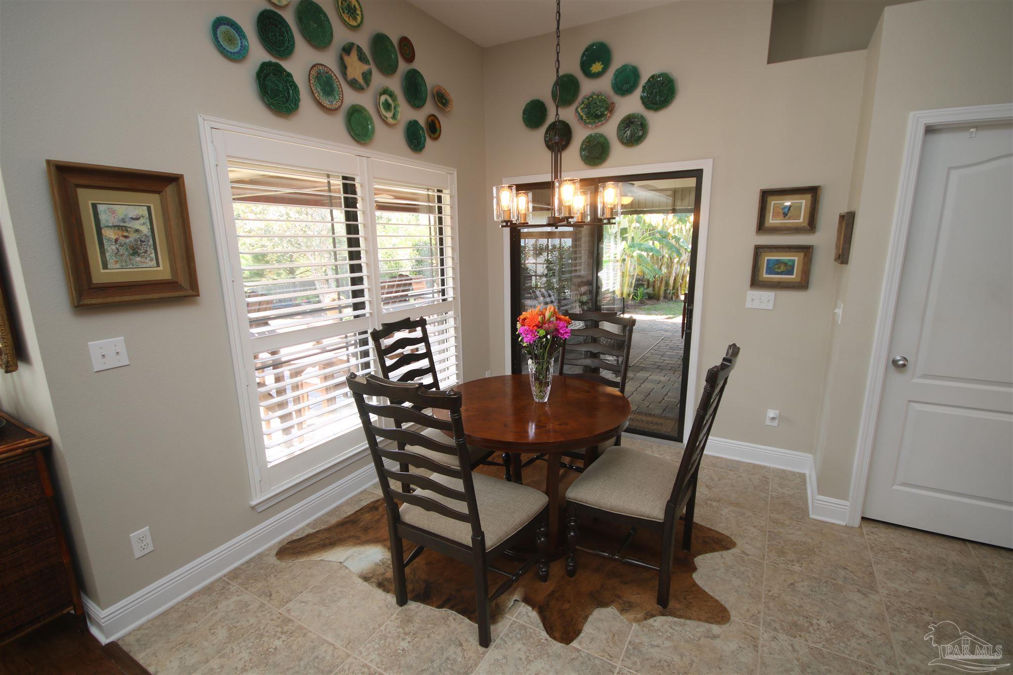 5790 Dunridge Drive Pace, FL 32571 - Photo 24 of 50 w/ sliding doors to the covered patio.