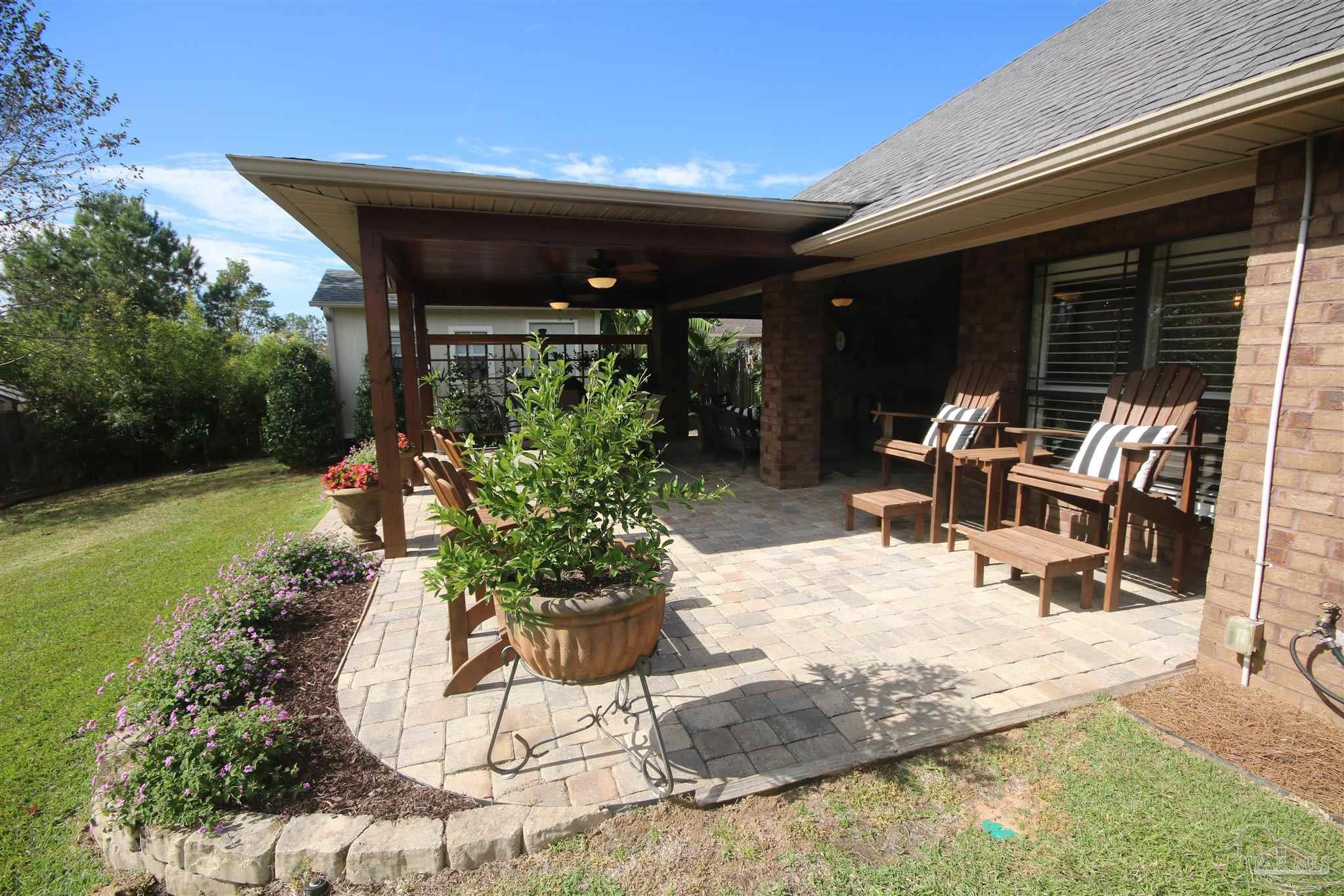 5790 Dunridge Drive Pace, FL 32571 - Photo 3 of 50 is perfect for relaxing & cooking out w/ family.