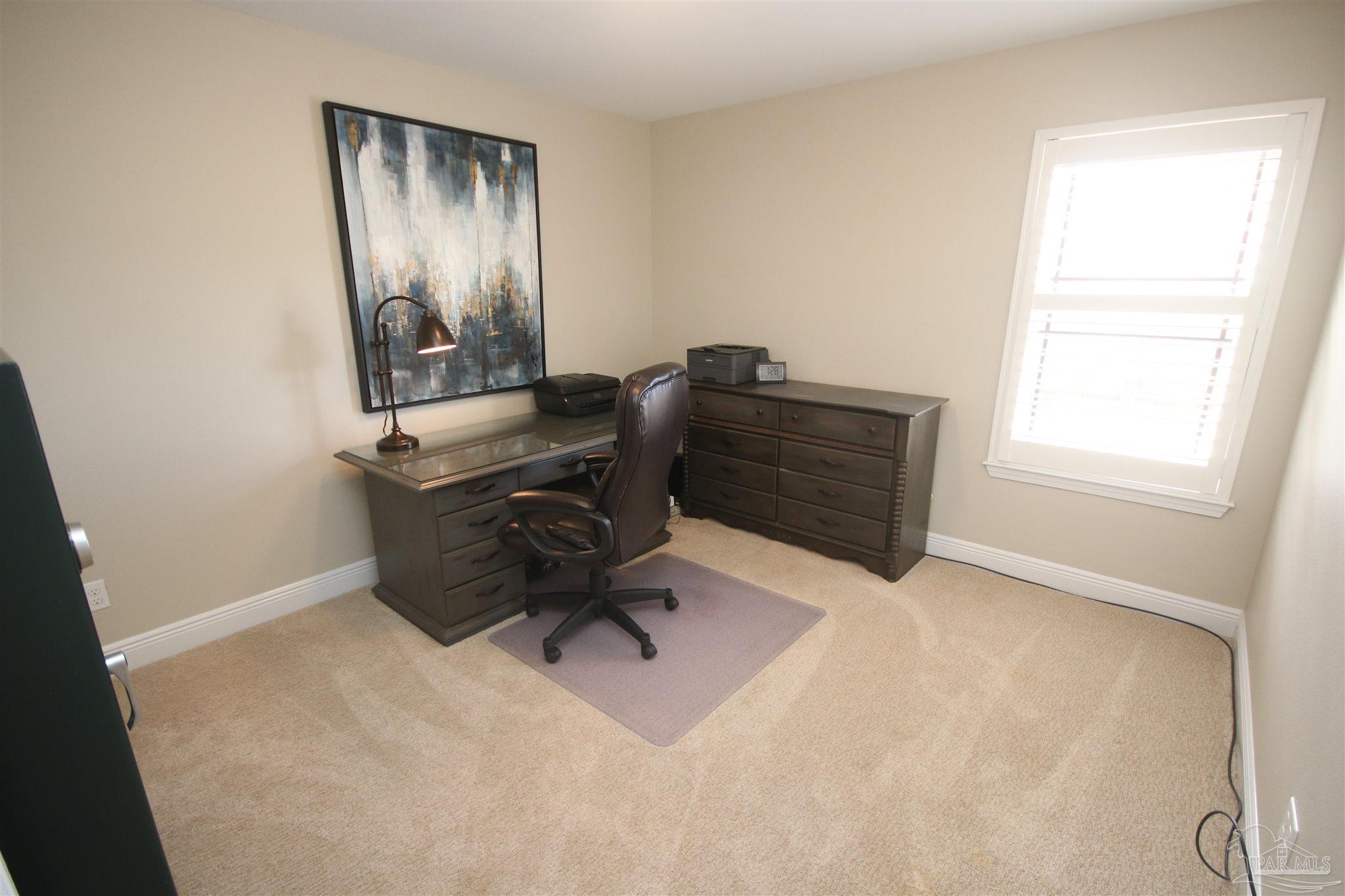 5790 Dunridge Drive Pace, FL 32571 - Photo 42 of 50 on the back right side of the home.