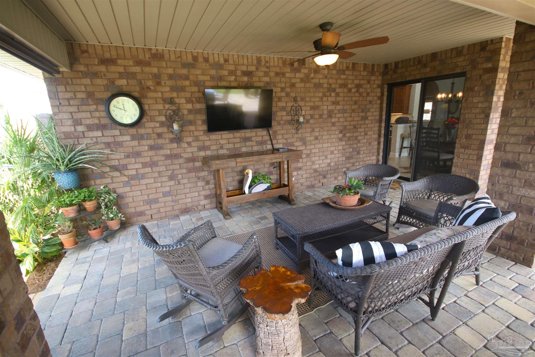 5790 Dunridge Drive Pace, FL 32571 - Photo 45 of 50 just inside the sliding glass doors to the right.