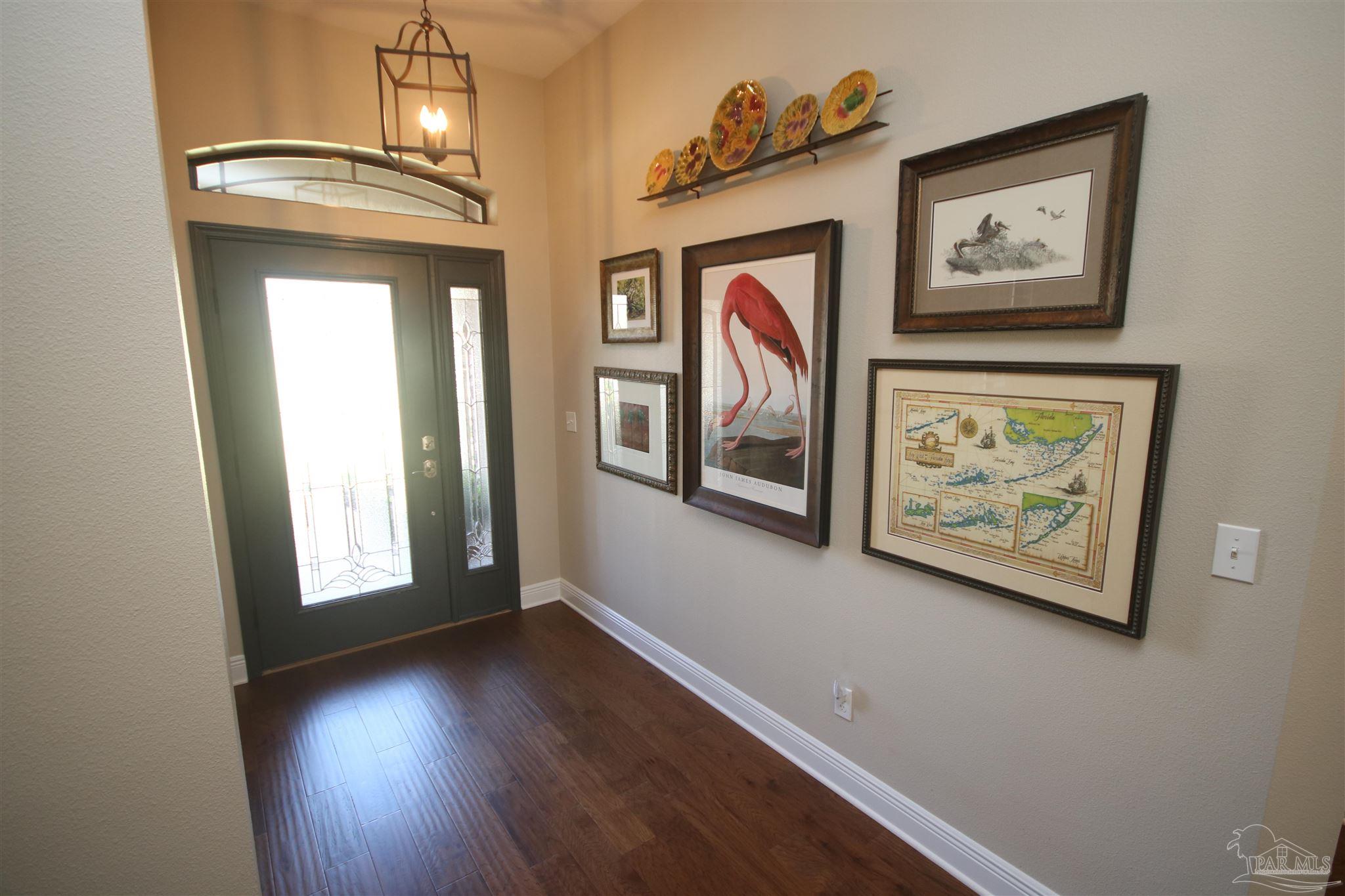 5790 Dunridge Drive Pace, FL 32571 - Photo 9 of 50 continues into all main living areas.