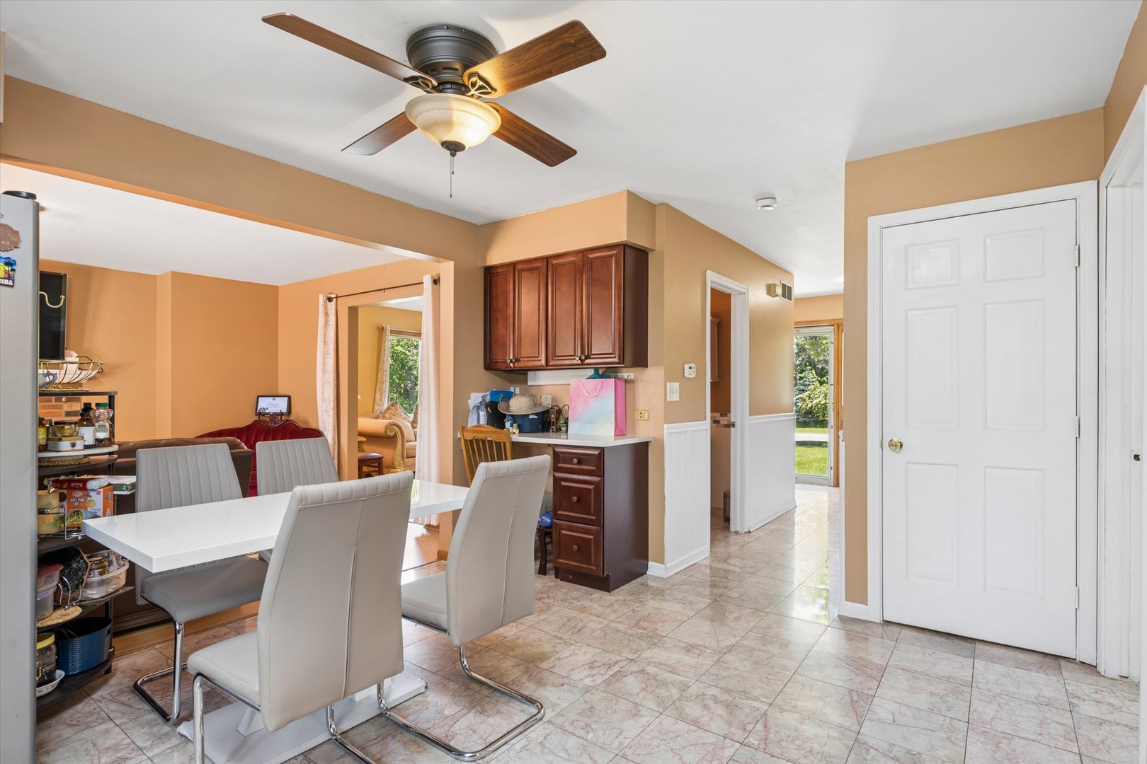 2142 North Summit Street Wheaton, IL 60187 - Photo 13 of 35 a view of a dining room with furniture window and wooden floor