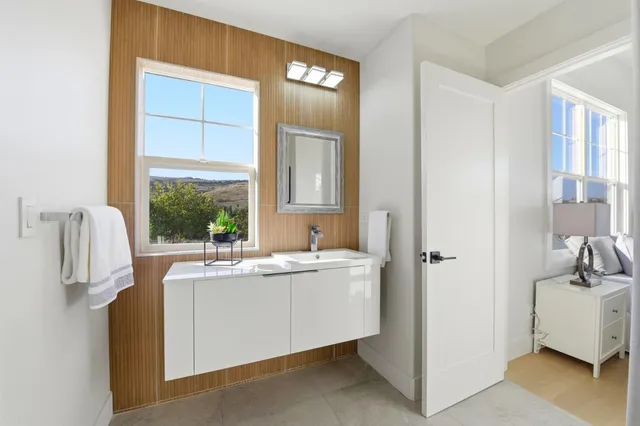 a room filled with furniture and a window