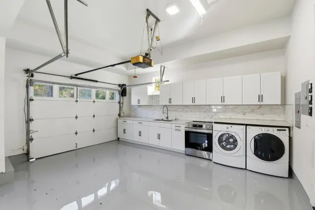 a view of a house with backyard porch and sitting area