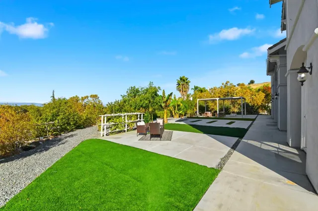 a front view of a house with swimming pool
