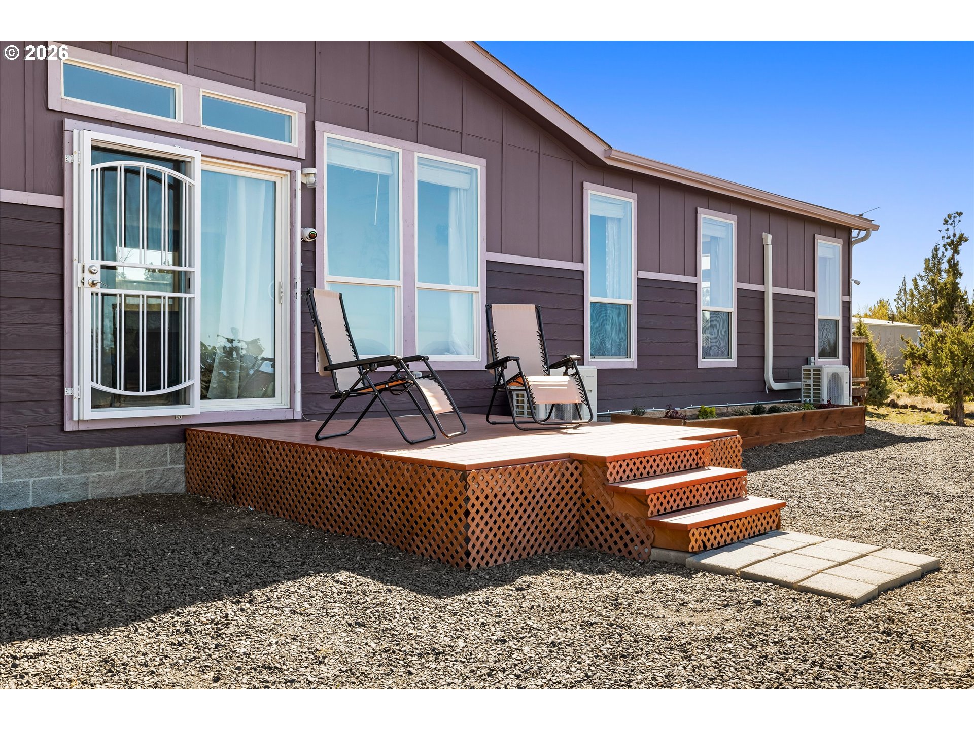 5172 Southeast Oswego Road Prineville, OR 97754 - Photo 33 of 48 a view of a house with swimming pool
