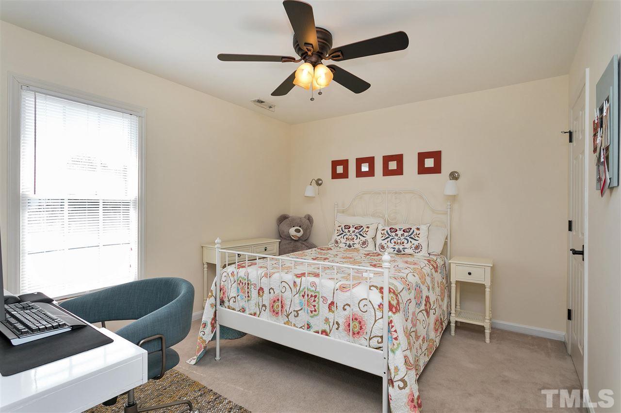 2337 Bolingbrook Lane Raleigh, NC 27613 - Photo 18 of 25 a bedroom with a bed and window