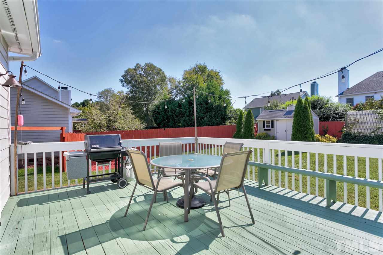 2337 Bolingbrook Lane Raleigh, NC 27613 - Photo 22 of 25 a view of a chairs and table in patio