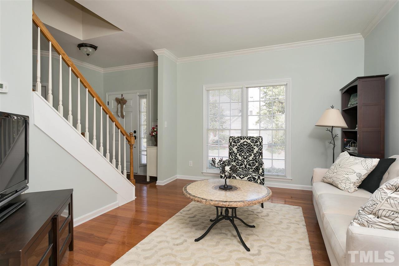 2337 Bolingbrook Lane Raleigh, NC 27613 - Photo 10 of 25 a living room with furniture rug and a window