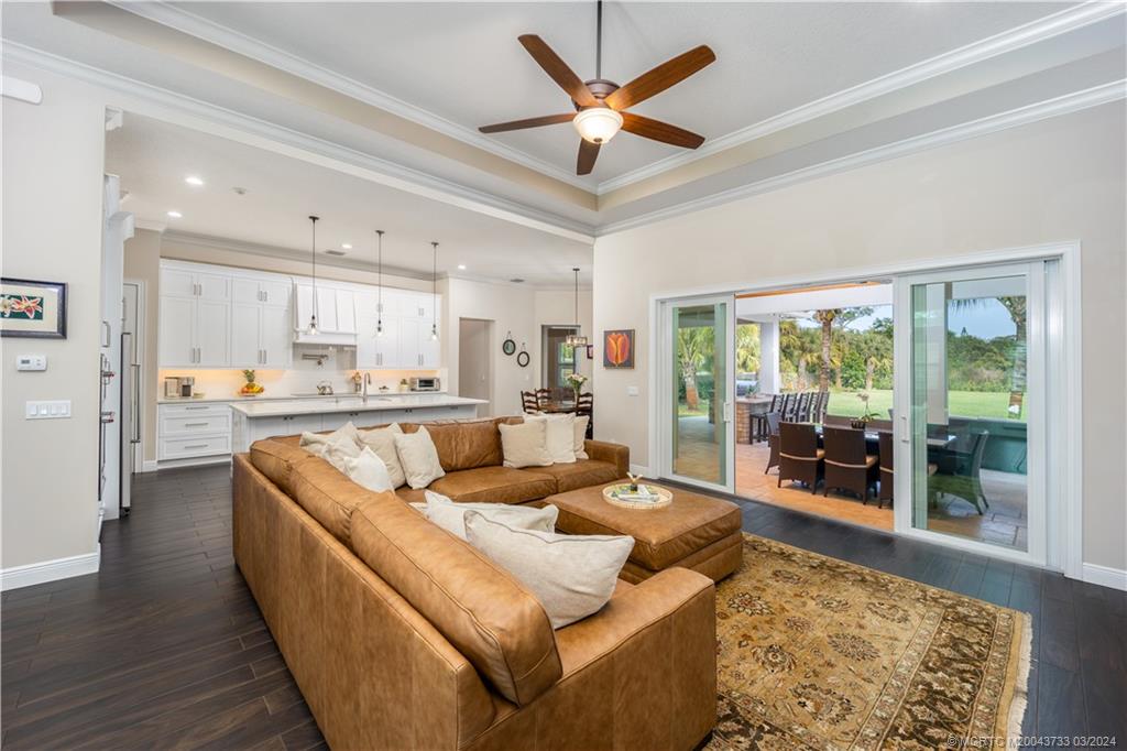 1665 Northwest Fork Road Stuart, FL 34994 - Photo 13 of 52 a living room with furniture and a large window
