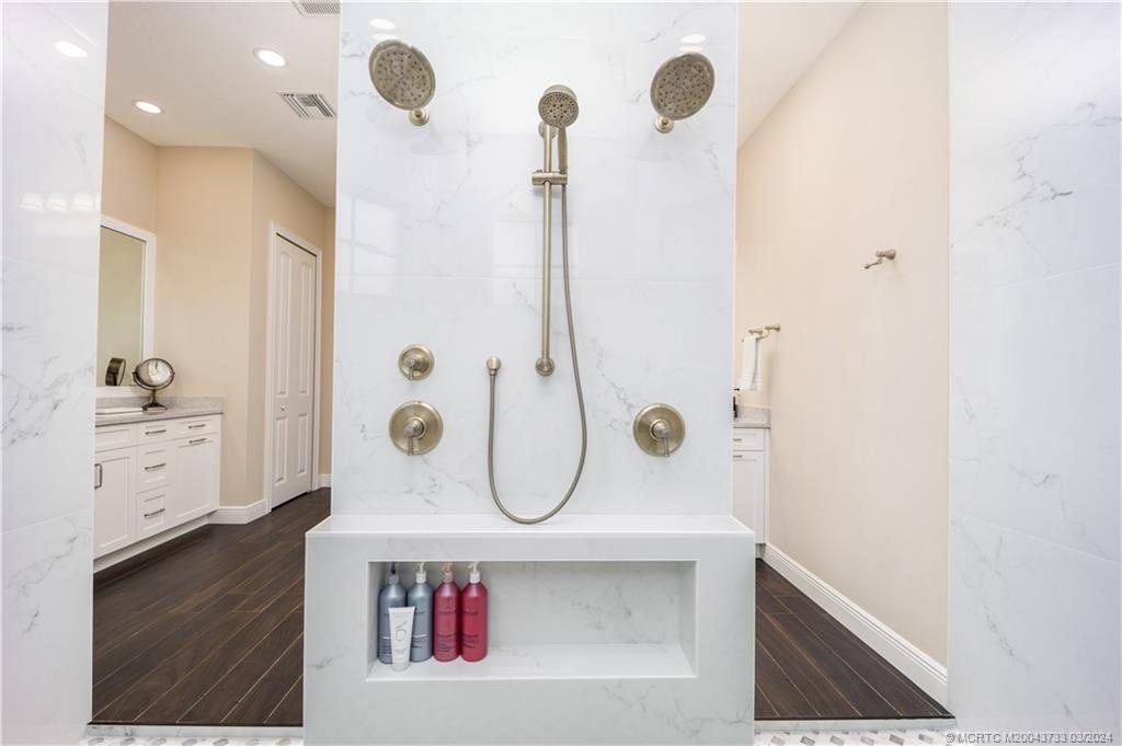 1665 Northwest Fork Road Stuart, FL 34994 - Photo 27 of 52 a bathroom with a shower