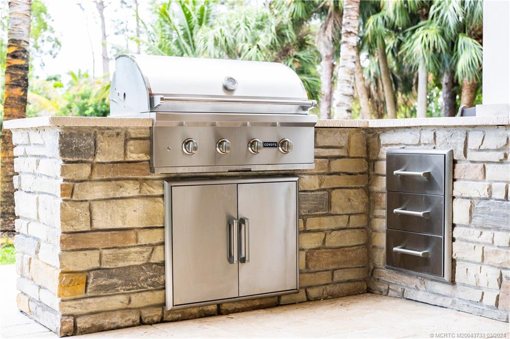 1665 Northwest Fork Road Stuart, FL 34994 - Photo 51 of 52 a view of outdoor space with wooden wall
