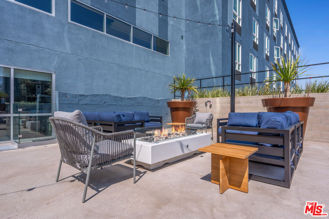 800 Western Avenue, Unit 727 Los Angeles, CA 90005 - Photo 19 of 26 a patio view with patio furniture and potted plants