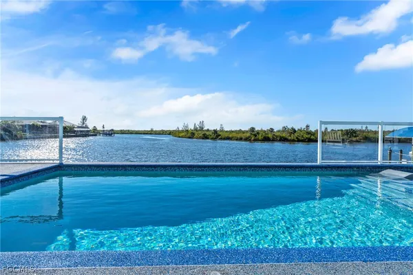 a view of a yard and ocean view