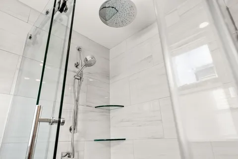 a bathroom with a mirror