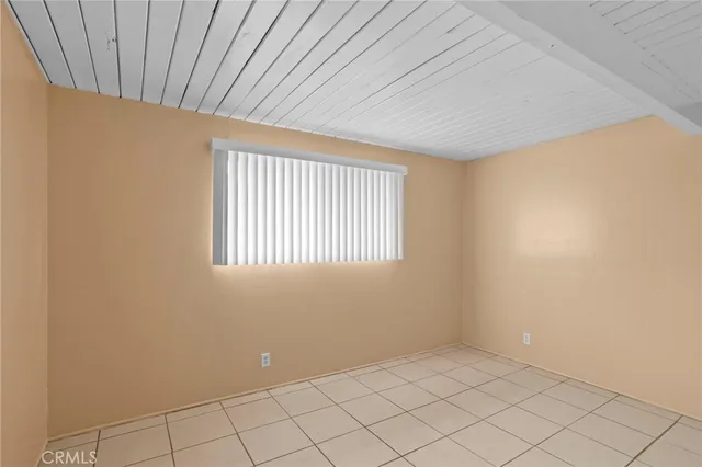 a view of an empty room with window