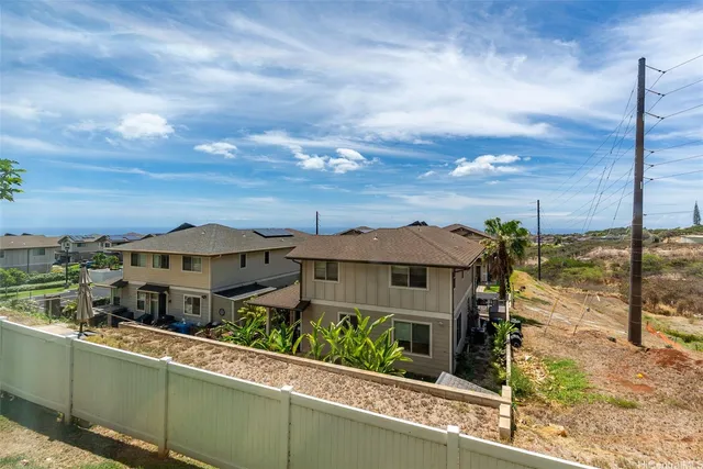 an aerial view of a house with a garden