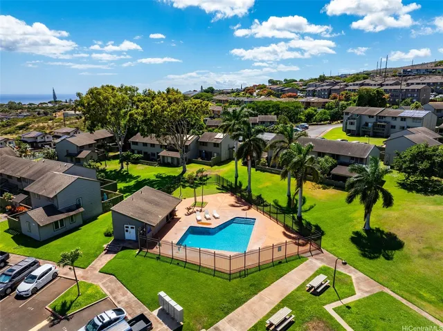 a view of a cars parked in front of a building