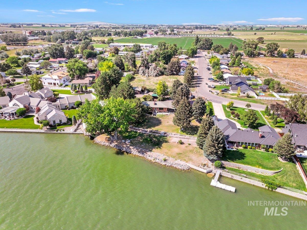 1801 Y Street Heyburn, ID 83336 - Photo 11 of 42 Aerial perspective of suburban area featuring a nearby body of water