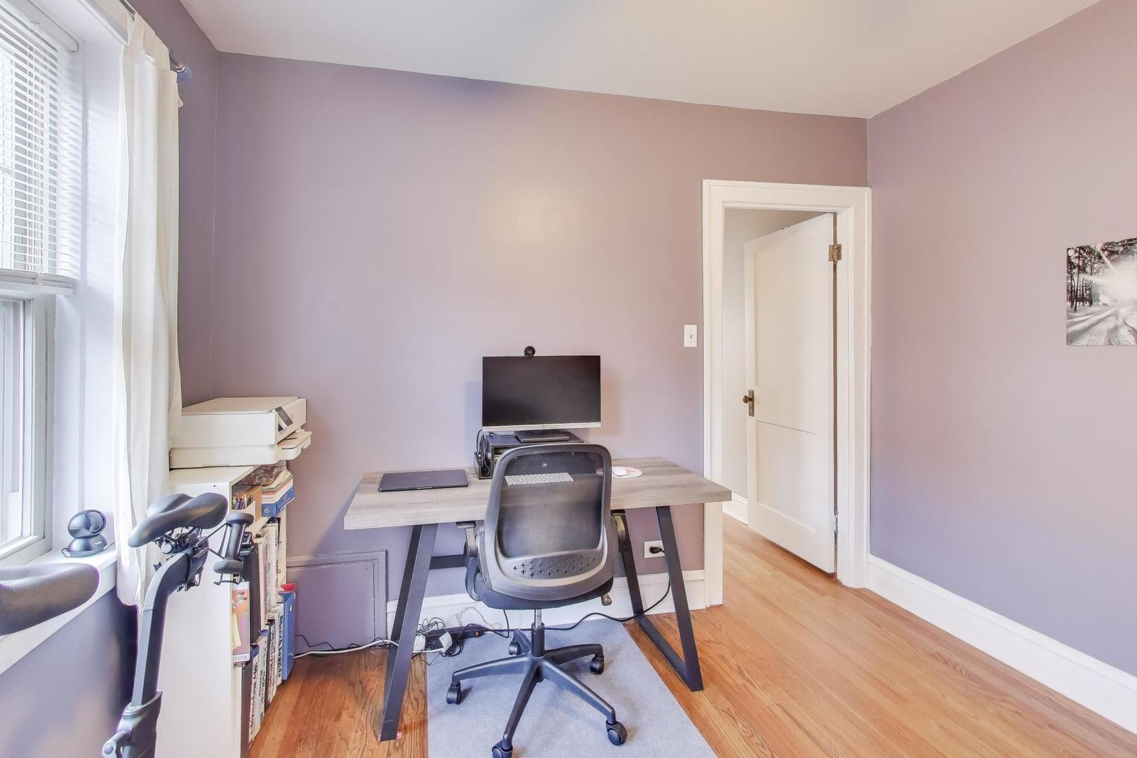 108 Lincoln Avenue, Unit 2B Riverside, IL 60546 - Photo 12 of 18 a workspace with furniture and wooden floor