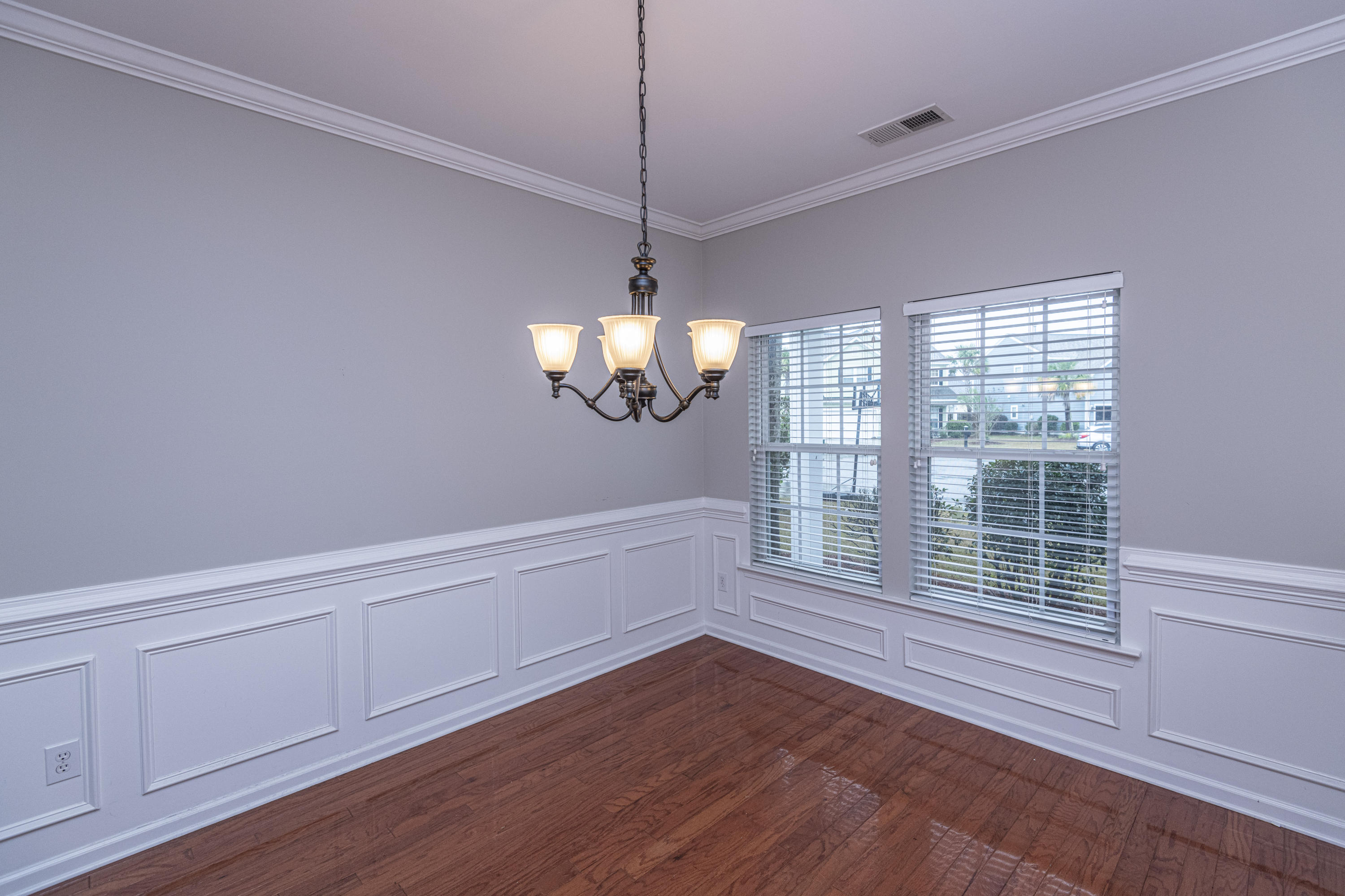 110 Tea Farm Way Wando, SC 29492 - Photo 3 of 36 Dining Room with detailed wainscoting