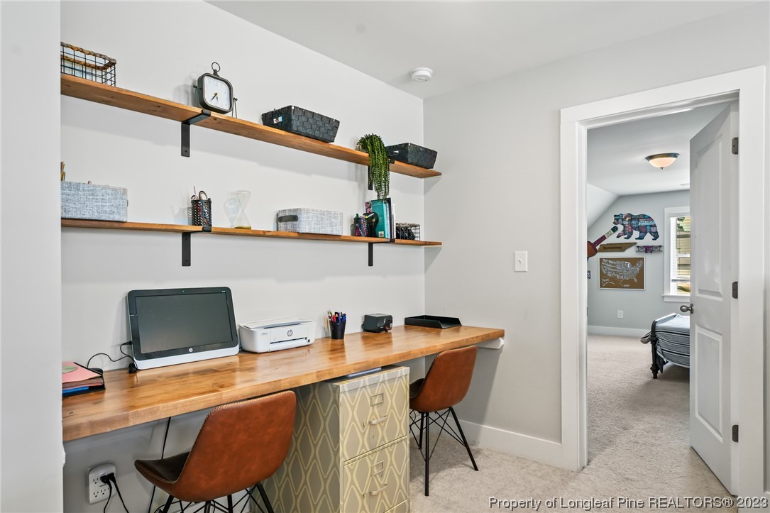 68 Spruce Hollow Circle Spring Lake, NC 28390 - Photo 23 of 48 a workspace with furniture and window