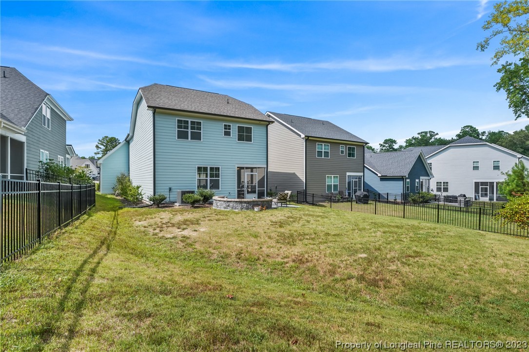 68 Spruce Hollow Circle Spring Lake, NC 28390 - Photo 45 of 48 a view of a house with a yard