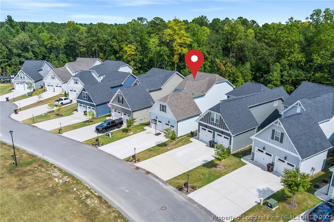 68 Spruce Hollow Circle Spring Lake, NC 28390 - Photo 47 of 48 an aerial view of a house with swimming pool