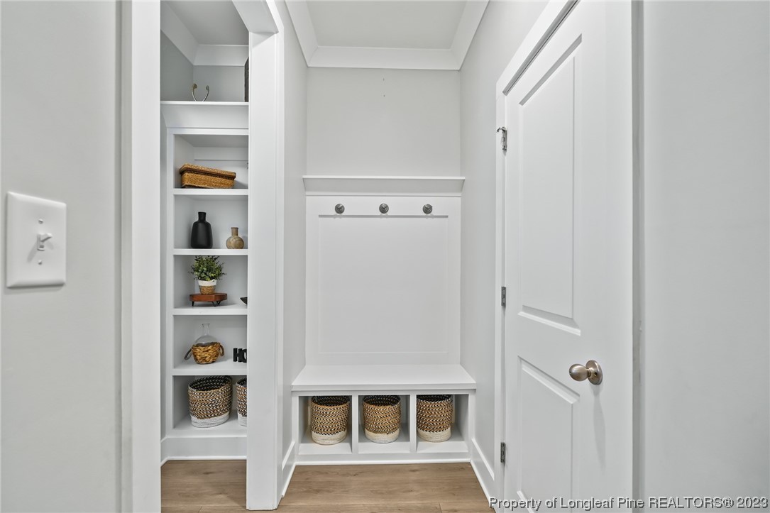 68 Spruce Hollow Circle Spring Lake, NC 28390 - Photo 5 of 48 a view of a hallway with shelf
