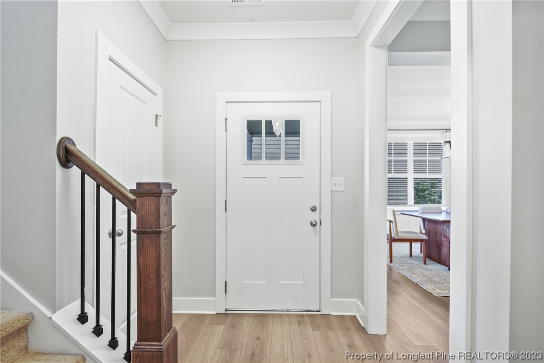 68 Spruce Hollow Circle Spring Lake, NC 28390 - Photo 7 of 48 a view of front door with stairs