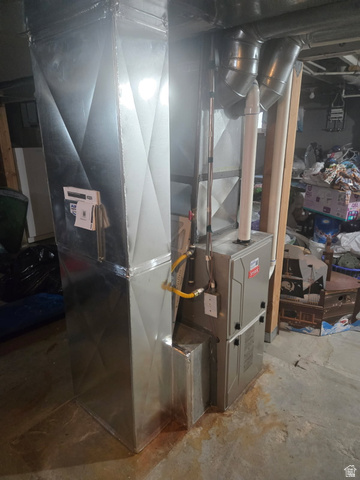27 Bryner Street Helper, UT 84526 - Photo 7 of 10 HVAC system with metal ductwork and visible gas line