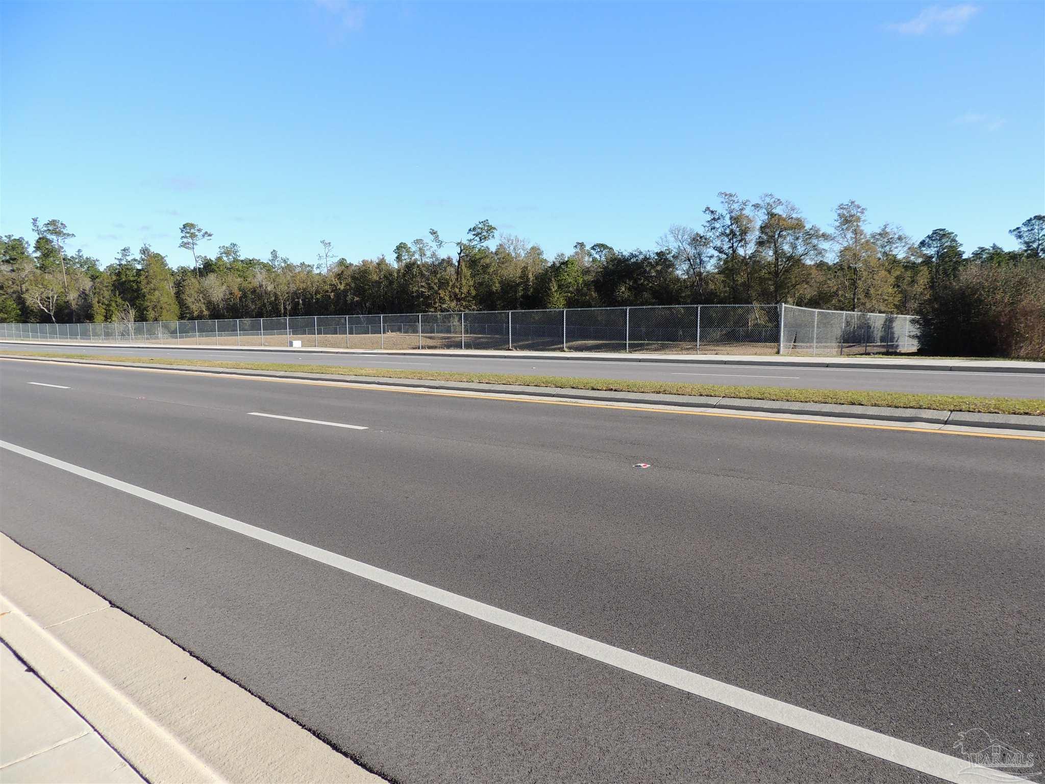 0 Pea Rdg Connector Road Pace, FL 32571 - Photo 8 of 10 a view of a tennis court