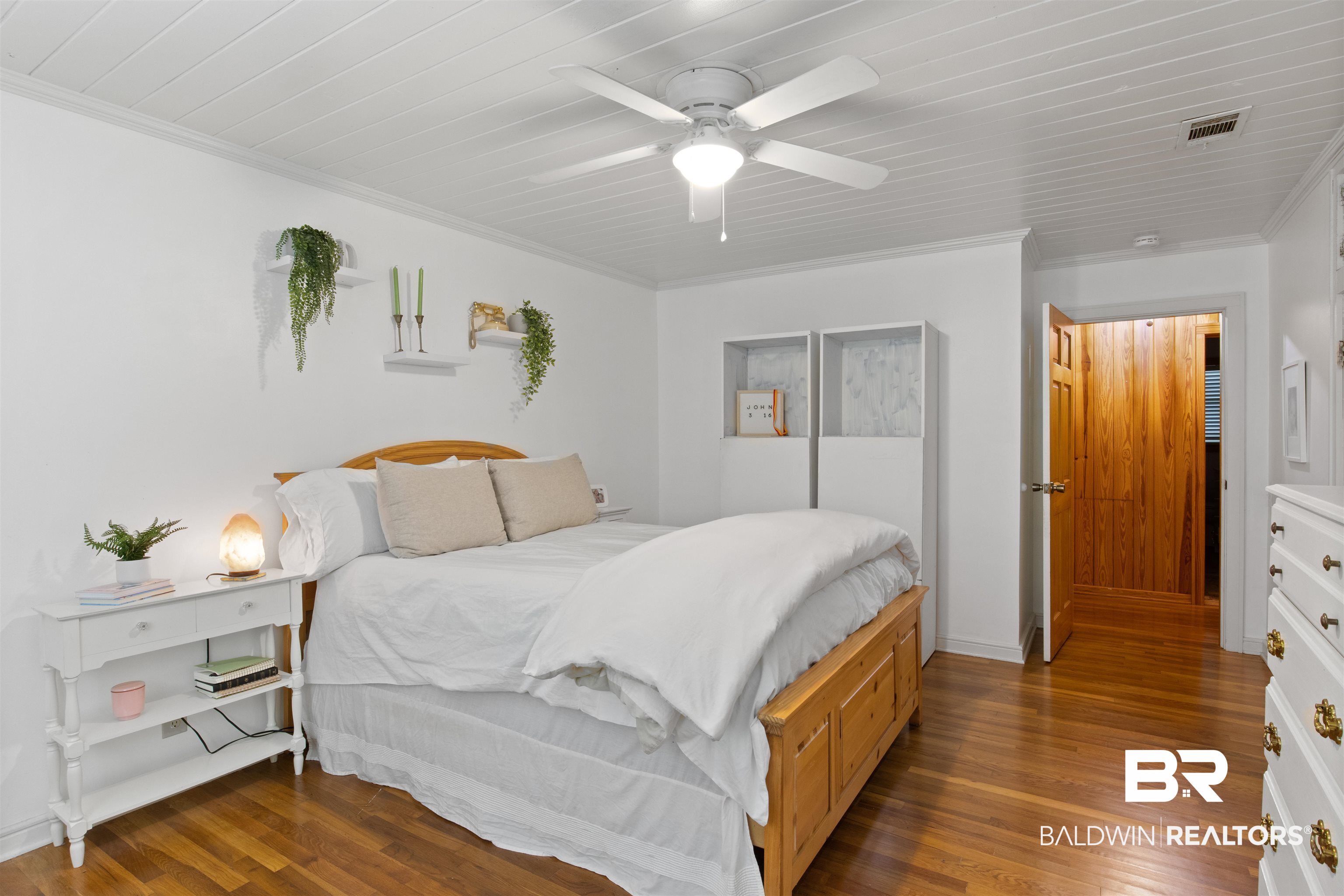 15100 Vasko Road Silverhill, AL 36576 - Photo 25 of 51 Bedroom with crown molding, dark wood-type flooring, and ceiling fan