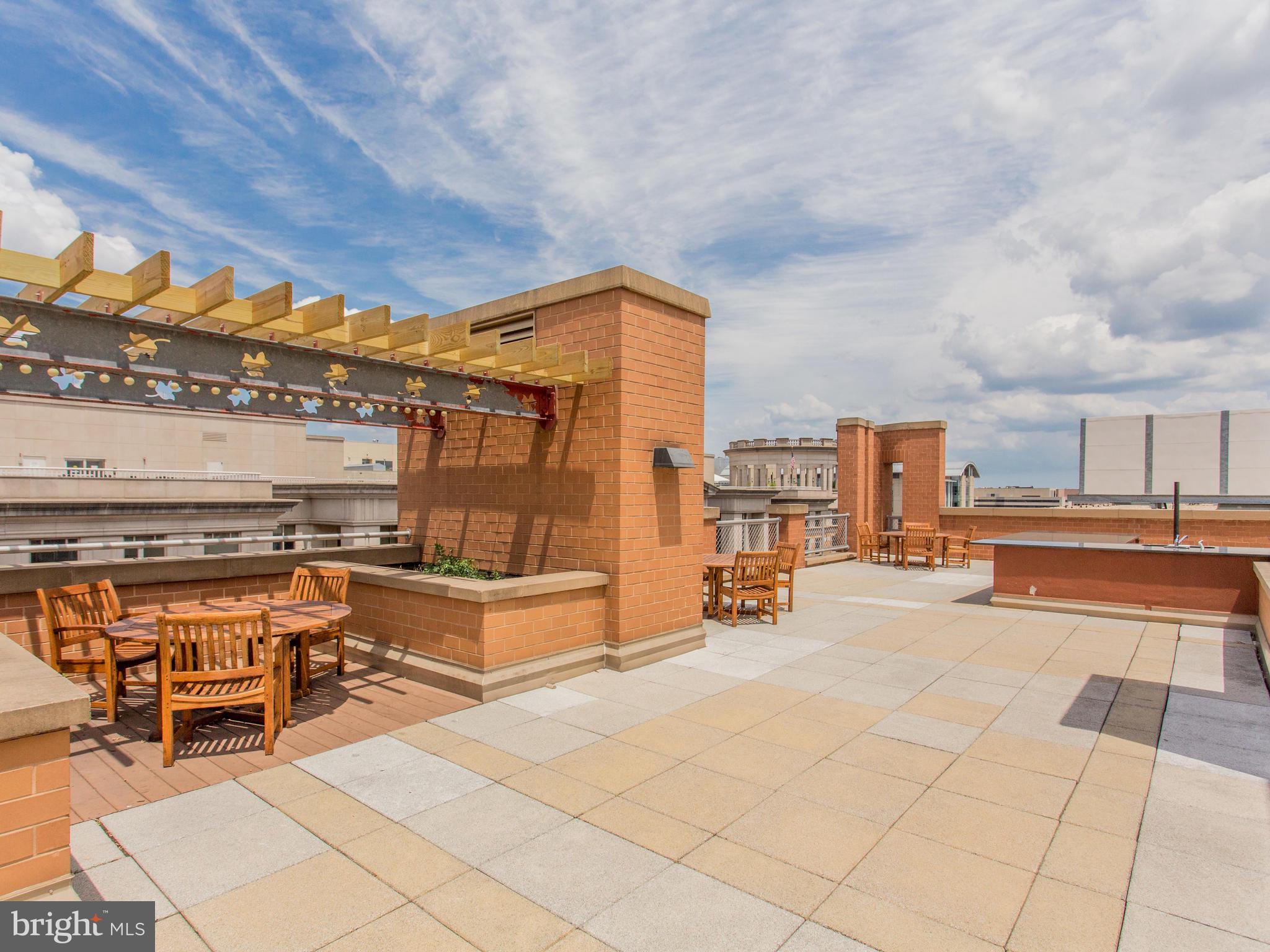 631 D Street Northwest, Unit 1132 Washington, DC 20004 - Photo 32 of 58 a view of a terrace with seating area