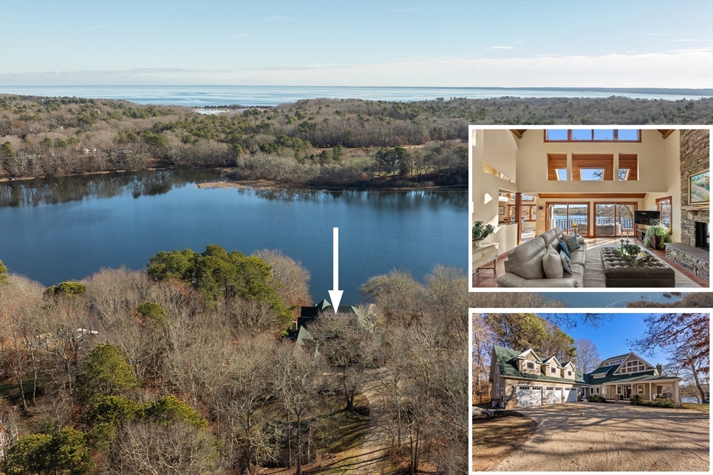 an aerial view of a house with a lake view